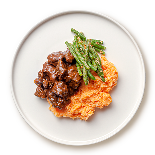 Braised beef braised welfare certified with sweet potato puree and green beans