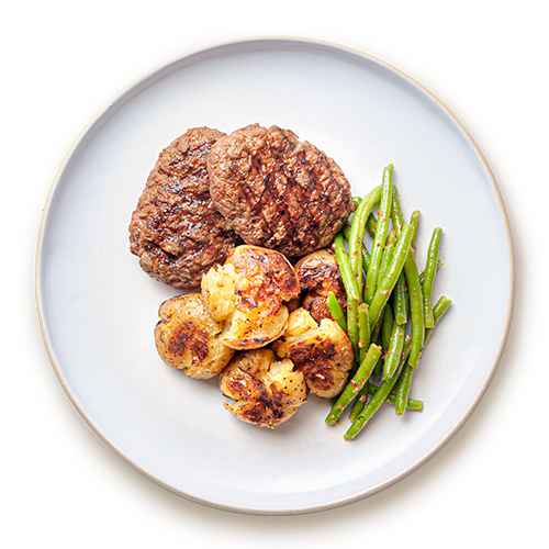 Beef burgers welfare certified with green beans and smashed potatoes