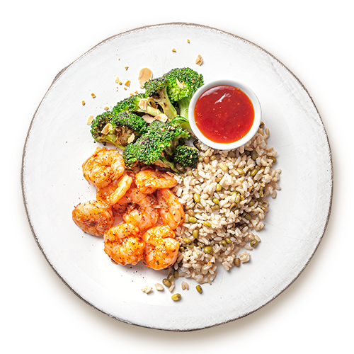 Sweet and sour black tiger prawns with roasted broccoli and brown rice